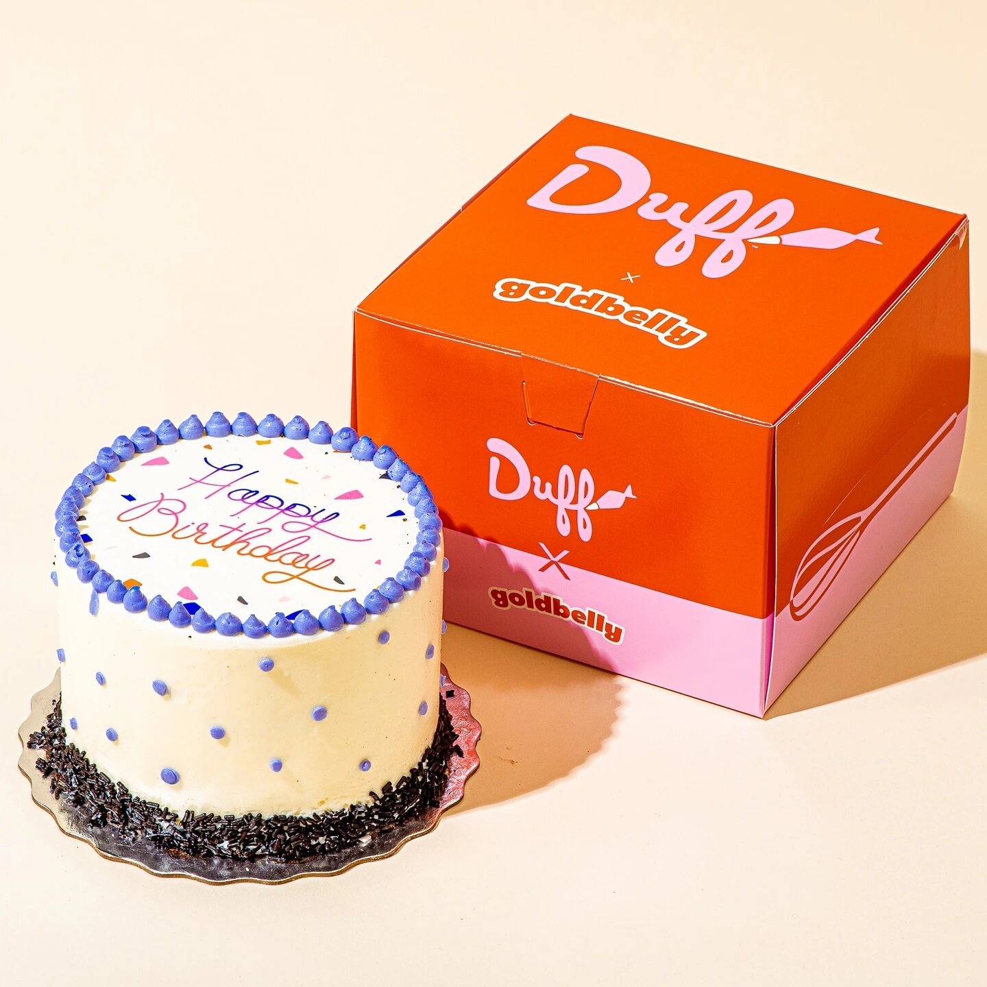 This showstopping cake is bound to be the star of any birthday party! This cake starts with a four-layer golden butter vanilla cake with purple buttercream filling. It&rsquo;s iced in white buttercream frosting and decorated with purple buttercream d